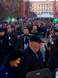Queen Sonya and King Harald pass right by Matthew on their way to the concert.