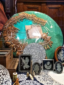 Rococo is festooned with an impressive array of antique lace. Note the incredible numbers of bobbins used to make the lace collar in back. 