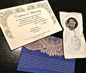 The brooch itself is modern, but the lace inside is "Point d'Alençon" needlepoint lace dating to 1785. I thought it was pretty reasonable ($90) considering its age.