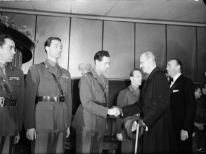 Pictured here are several of the successful saboteurs with King Haakon at the premier of the film, "The Heavy Water War" in 1948.