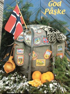 I love this Easter postcard, which wishes the recipient "Good Pasque." It shows how a good Norwegian celebrates the season. The knapsack contains patches showing the requisite hikes around the country, classic knitted Norwegian gloves, oranges, and a wooden birch cup for getting water out of mountain streams. 