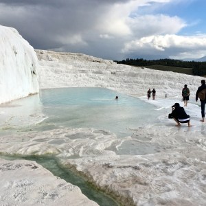 The day was a bit chilly, but this little boy jumped right in and lay down in the warm pool for a good soak. 