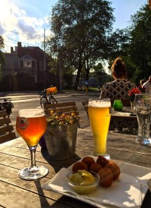 Tasty bitterballs, two frosty beers, and sunshine -- just what the doctor ordered.
