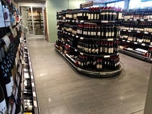 In an effort to generate tax revenue and manage alcoholism, state-controlled Vinmonopolets are the only licensed vendors of alcohol greater than 4.75%. They provide an astonishing array of wines (note the fine-vintages section in the background of this photo.)